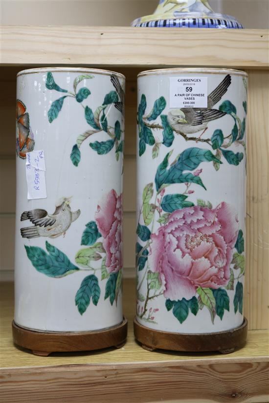 A pair of Chinese famille rose cylindrical vases, Tongzhi mark and period H.31cm